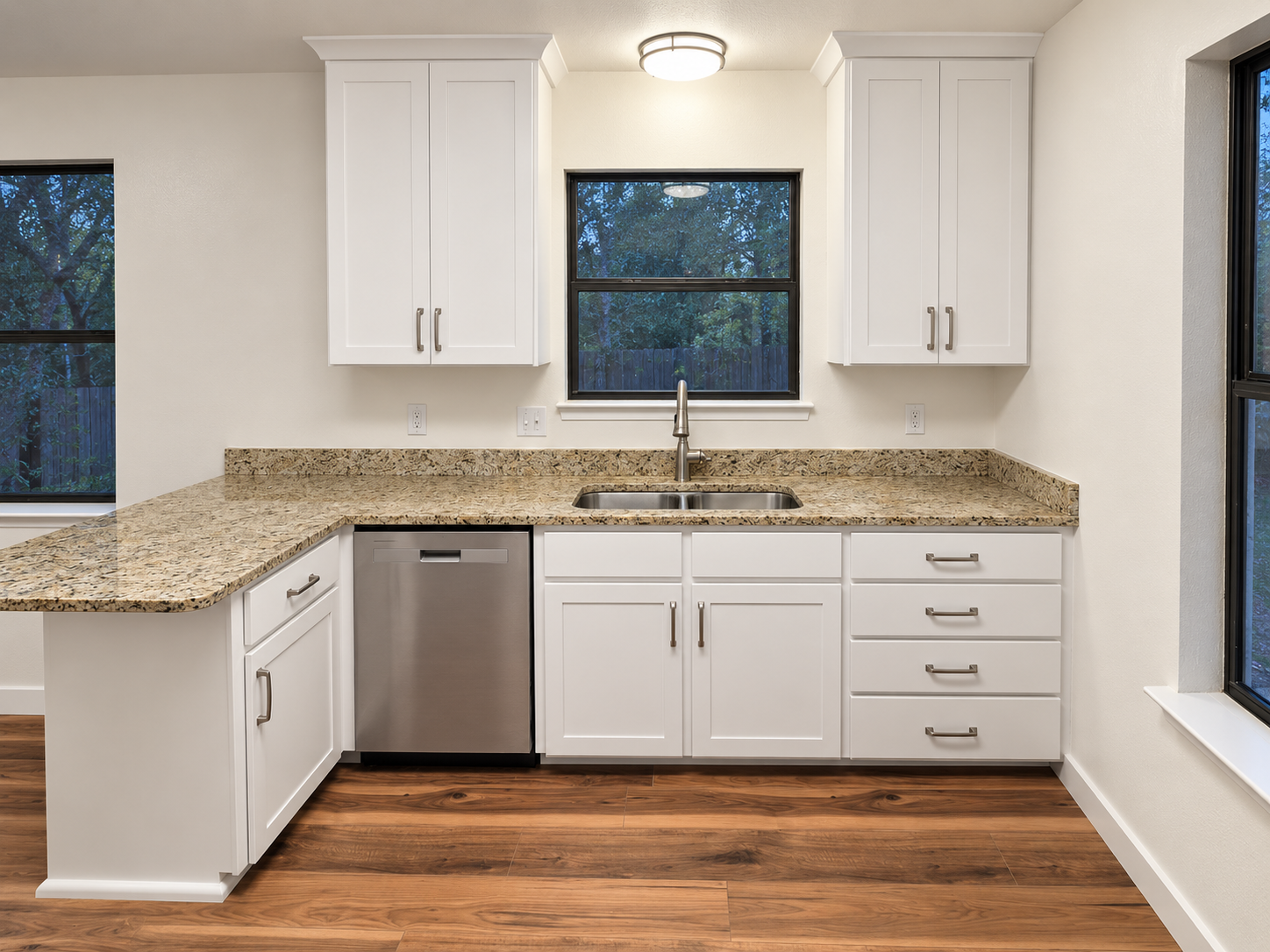 Finished kitchen with new upper cabinets and professionally refaced lower cabinets