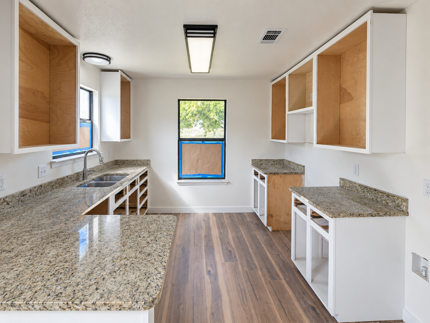 Wide view of the cabinet project while doors and drawer fronts were being installed